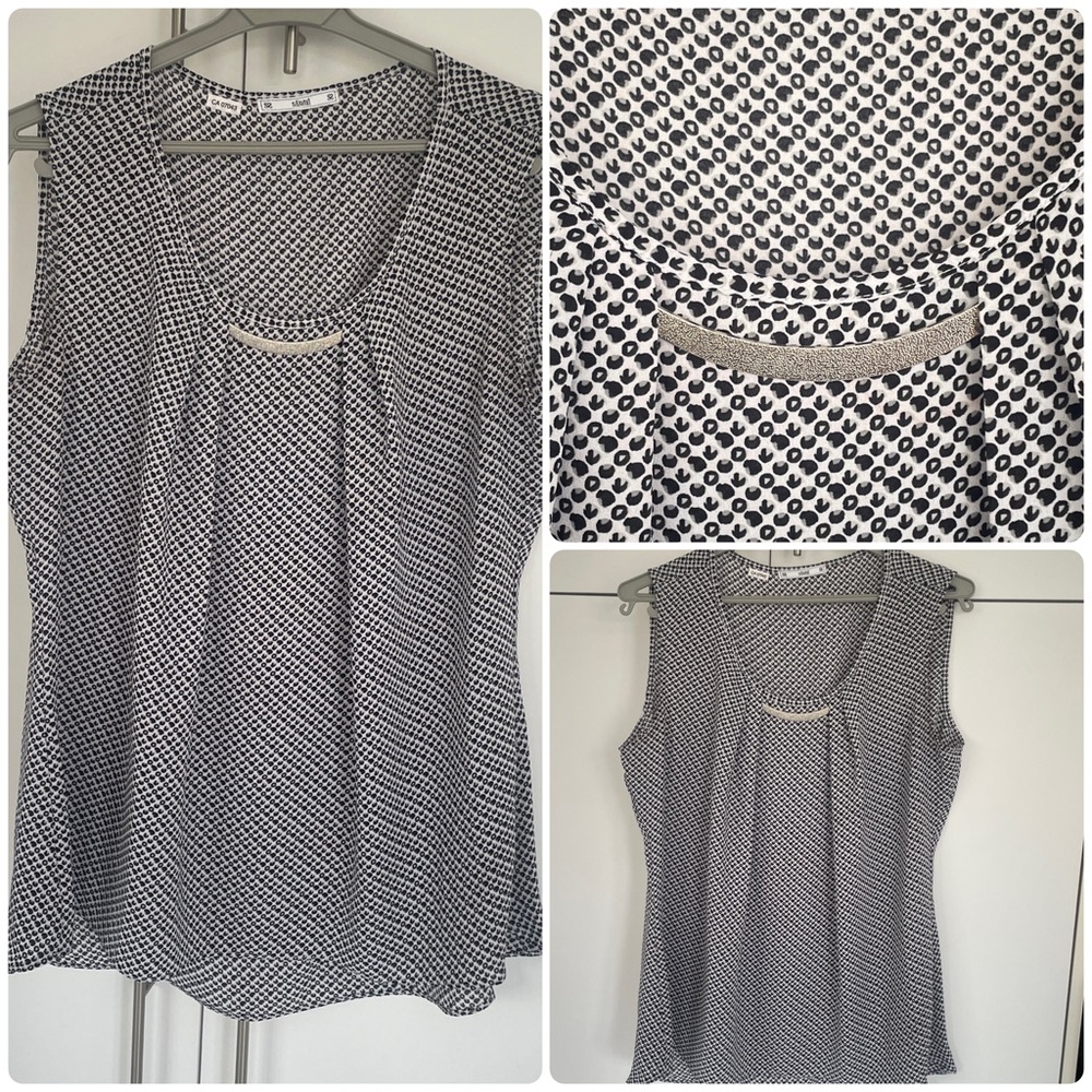 Sioni Black White Patterned Sleeveless Blouse High Low Rounded Hem Medium